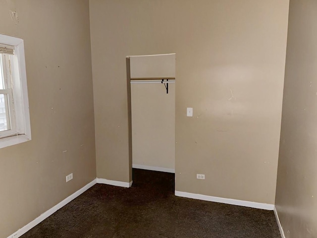 663 W 117th Pl, Chicago, IL 60628 - carpeted empty room with baseboards