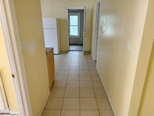 663 W 117th Pl, Chicago, IL 60628 - hall featuring light tile patterned flooring and baseboards