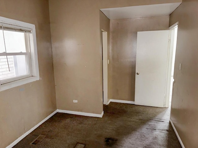 663 W 117th Pl, Chicago, IL 60628 - empty room with carpet floors and baseboards