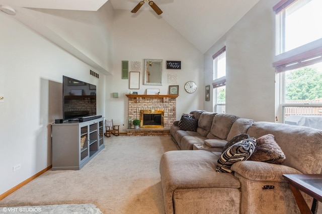 4705 Peacock Ln, Plainfield, IL 60586 - living room featuring high vaulted ceiling, a fireplace, a ceiling fan, and carpet