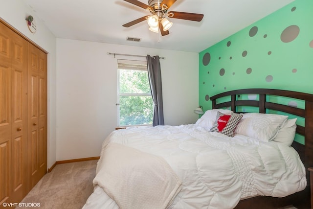 4705 Peacock Ln, Plainfield, IL 60586 - bedroom featuring carpet floors, a closet, a ceiling fan, and an accent wall