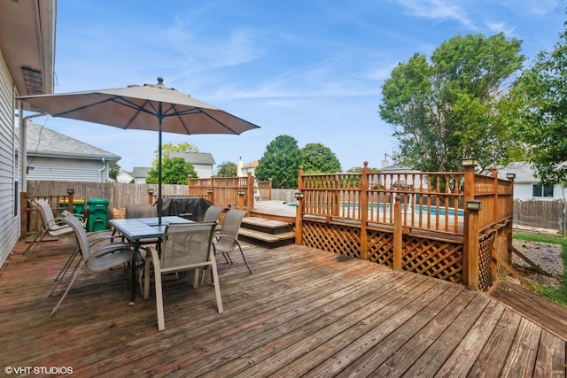 4705 Peacock Ln, Plainfield, IL 60586 - deck with outdoor dining area and a fenced backyard