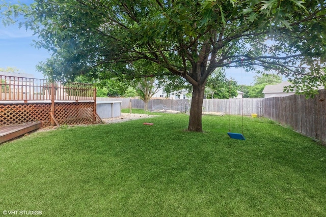 4705 Peacock Ln, Plainfield, IL 60586 - fenced backyard with a wooden deck