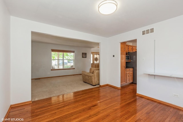 4705 Peacock Ln, Plainfield, IL 60586 - unfurnished room with wood finished floors and baseboards