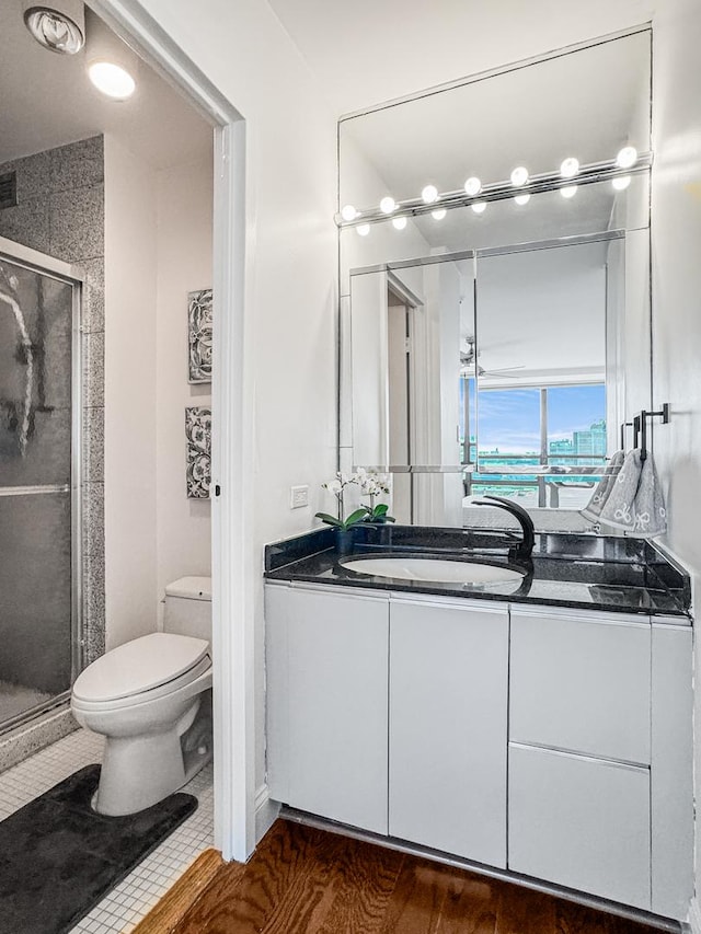 3150 N Sheridan Rd Unit 10C, Chicago, IL 60657 - bathroom featuring vanity, a stall shower, and tile patterned floors