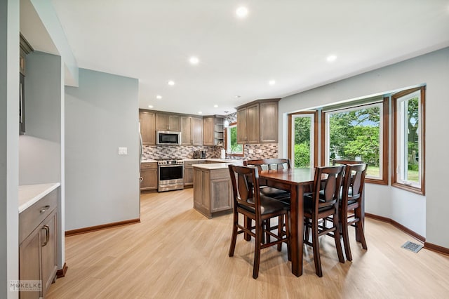 2430 Lakeside Dr, Aurora, IL 60504 - dining room with recessed lighting and light wood finished floors