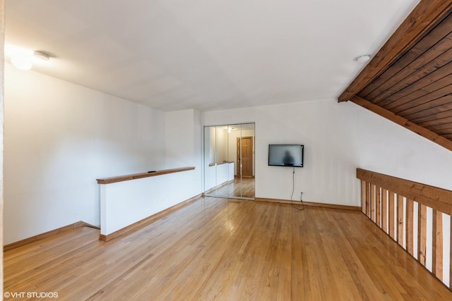3341 Beacon St Unit 32, North Chicago, IL 60064 - empty room with wood finished floors and baseboards