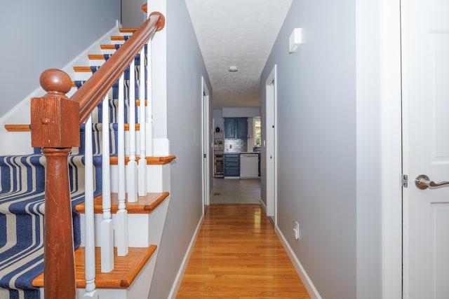 3308 Cumbria Dr, Bloomington, IL 61704 - hallway featuring light wood-type flooring and stairs