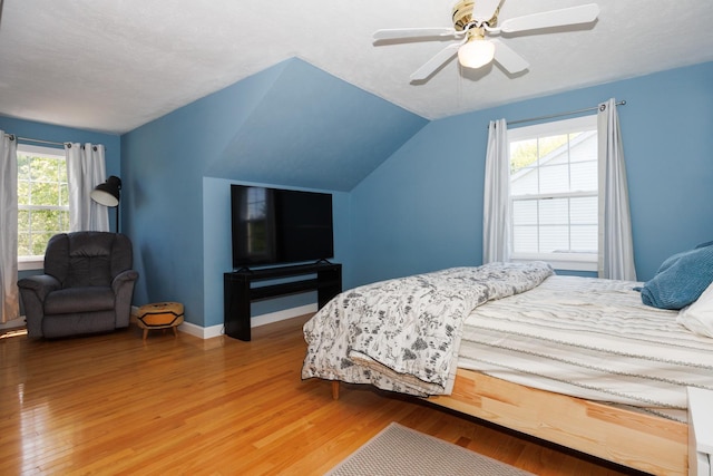3308 Cumbria Dr, Bloomington, IL 61704 - bedroom featuring light wood-style flooring, lofted ceiling, and a ceiling fan