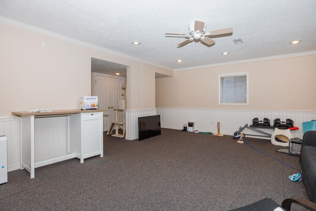3308 Cumbria Dr, Bloomington, IL 61704 - exercise area with wainscoting, carpet, crown molding, a ceiling fan, and recessed lighting