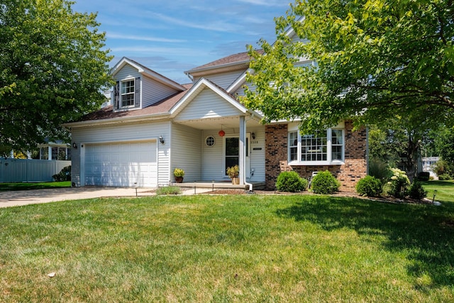 3308 Cumbria Dr, Bloomington, IL 61704 - traditional-style house with concrete driveway, brick siding, and covered porch