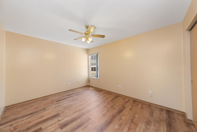 914 Garden Ln Unit 914, Homewood, IL 60430 - empty room featuring light wood-style flooring and ceiling fan