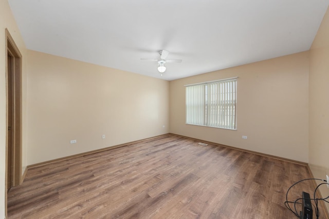 914 Garden Ln Unit 914, Homewood, IL 60430 - empty room featuring a ceiling fan and wood finished floors