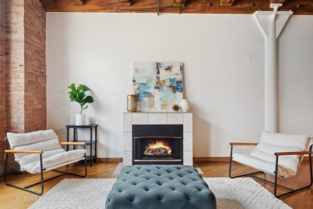 732 S Financial Pl Unit 202, Chicago, IL 60605 - sitting room with wood finished floors and a fireplace