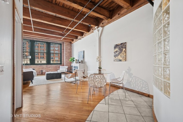 732 S Financial Pl Unit 202, Chicago, IL 60605 - living area featuring a wood ceiling with exposed beams and wood finished floors