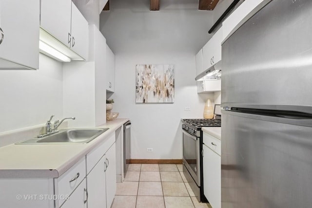 732 S Financial Pl Unit 202, Chicago, IL 60605 - kitchen featuring appliances with stainless steel finishes, under cabinet range hood, light countertops, white cabinets, and light tile patterned floors