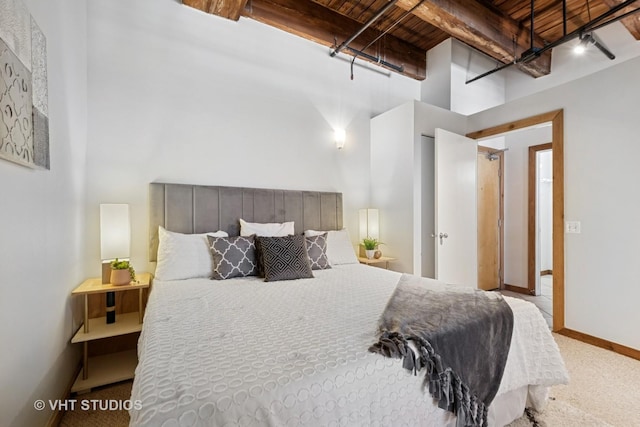 732 S Financial Pl Unit 202, Chicago, IL 60605 - carpeted bedroom with a wooden ceiling with exposed beams and a high ceiling