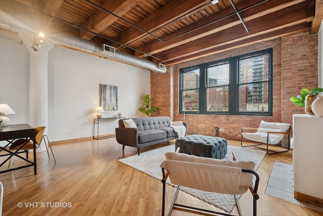 732 S Financial Pl Unit 202, Chicago, IL 60605 - living room featuring brick wall, a wooden ceiling with exposed beams, and wood finished floors