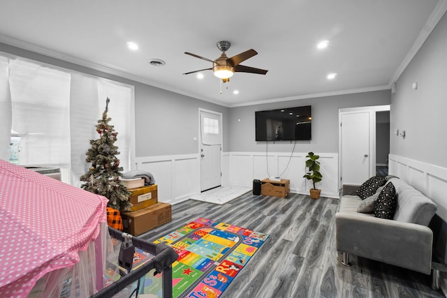 19 Apple Ln, Park Forest, IL 60466 - living area featuring ceiling fan, wood finished floors, ornamental molding, a wainscoted wall, and recessed lighting