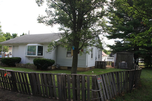 1 Elm Dr, Bethany, IL 61914 - view of home's exterior with a storage shed