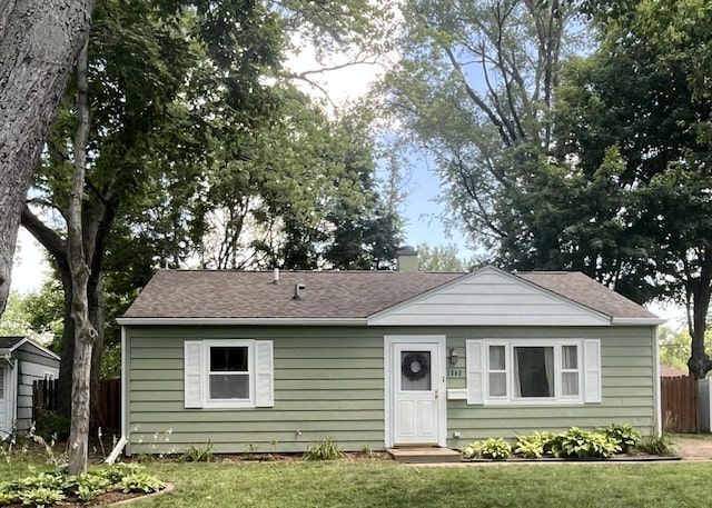 1302 Briarcliff Dr, Urbana, IL 61801 - bungalow with a chimney and a shingled roof