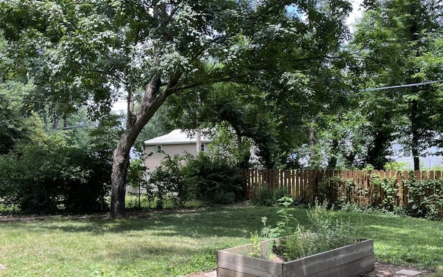 1302 Briarcliff Dr, Urbana, IL 61801 - view of yard featuring a vegetable garden