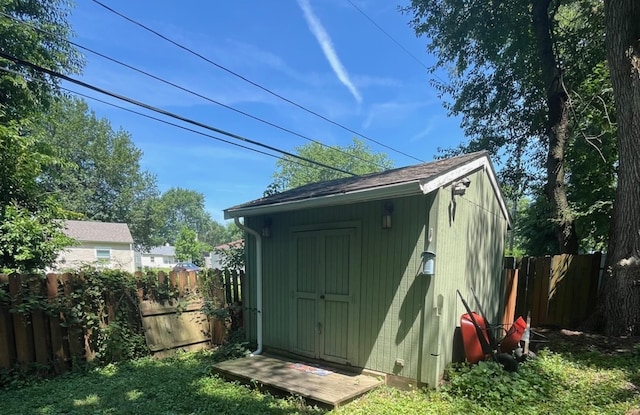 1302 Briarcliff Dr, Urbana, IL 61801 - view of shed with a fenced backyard