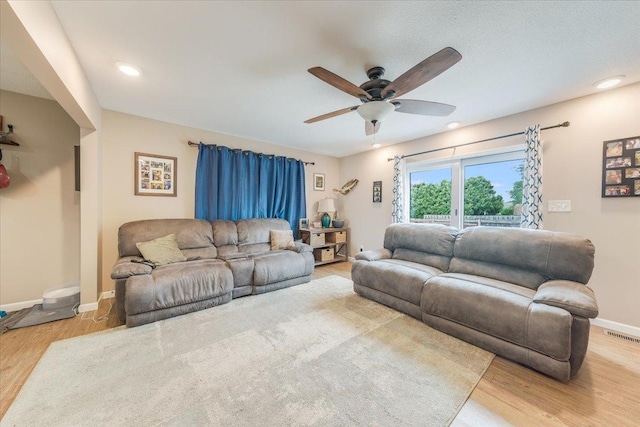 505 Tamula Dr, Mahomet, IL 61853 - living area with wood finished floors, a ceiling fan, and recessed lighting