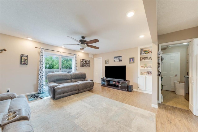 505 Tamula Dr, Mahomet, IL 61853 - living room featuring light wood finished floors, ceiling fan, and recessed lighting
