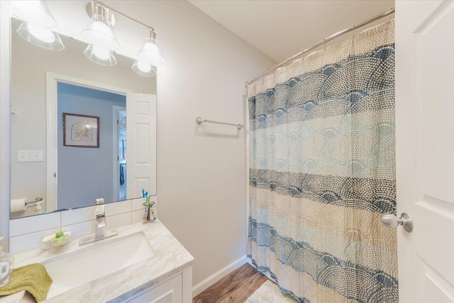 505 Tamula Dr, Mahomet, IL 61853 - full bath featuring vanity and wood finished floors