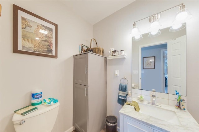 505 Tamula Dr, Mahomet, IL 61853 - half bath featuring vanity and toilet