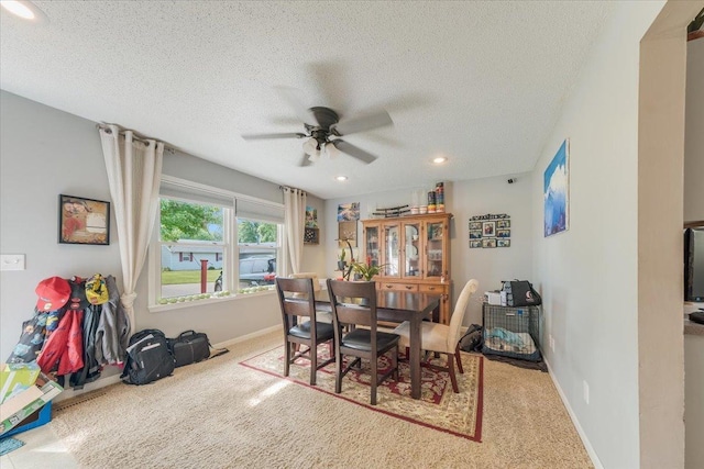 505 Tamula Dr, Mahomet, IL 61853 - carpeted dining room with ceiling fan, a textured ceiling, and recessed lighting