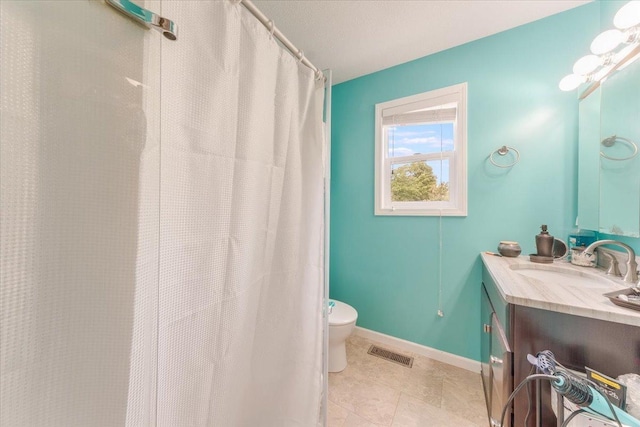 505 Tamula Dr, Mahomet, IL 61853 - bathroom with vanity, a shower with curtain, and tile patterned flooring