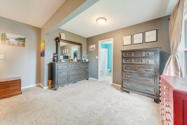 505 Tamula Dr, Mahomet, IL 61853 - carpeted bedroom with baseboards and ensuite bathroom