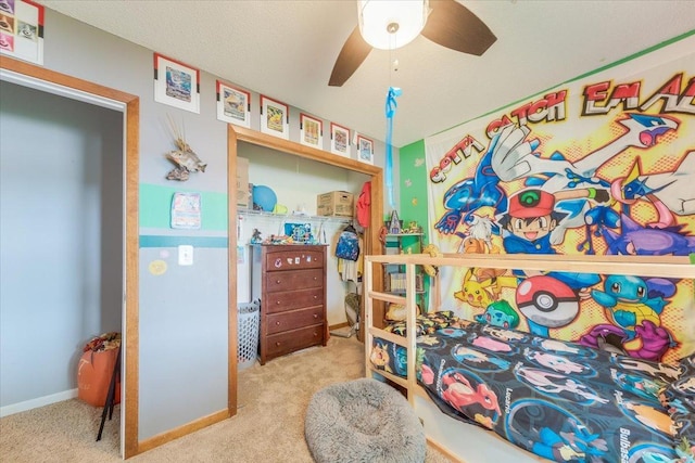 505 Tamula Dr, Mahomet, IL 61853 - carpeted bedroom featuring a ceiling fan and baseboards