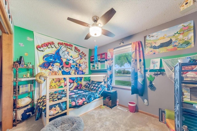 505 Tamula Dr, Mahomet, IL 61853 - bedroom with carpet floors, a textured ceiling, and ceiling fan