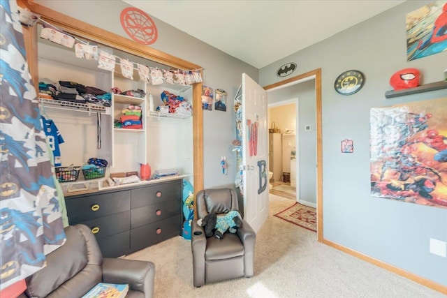 505 Tamula Dr, Mahomet, IL 61853 - bedroom with light carpet and baseboards