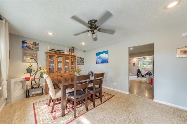 505 Tamula Dr, Mahomet, IL 61853 - carpeted dining space with ceiling fan, recessed lighting, and a textured ceiling