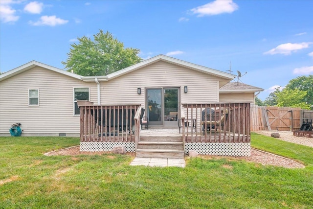 505 Tamula Dr, Mahomet, IL 61853 - back of property with a wooden deck and a gate
