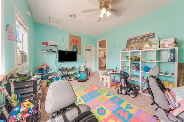 505 Tamula Dr, Mahomet, IL 61853 - game room with ceiling fan, carpet floors, and cooling unit