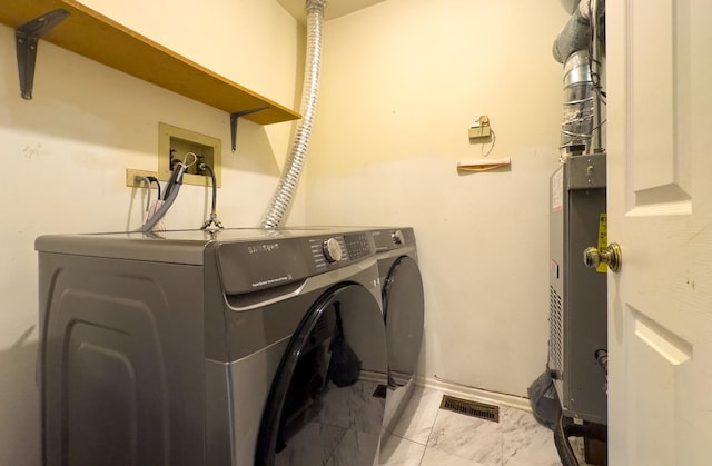 962 Harvest Cir, Buffalo Grove, IL 60089 - laundry area with independent washer and dryer and marble finish flooring
