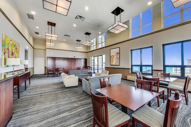 401 E Ontario St Unit 3008, Chicago, IL 60611 - carpeted dining area featuring a high ceiling and recessed lighting