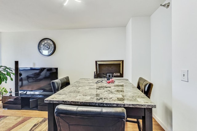 401 E Ontario St Unit 3008, Chicago, IL 60611 - dining space with wood finished floors and baseboards