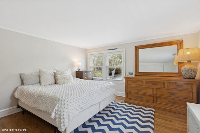 311 Wagner Rd, Northfield, IL 60093 - bedroom with wood finished floors and crown molding