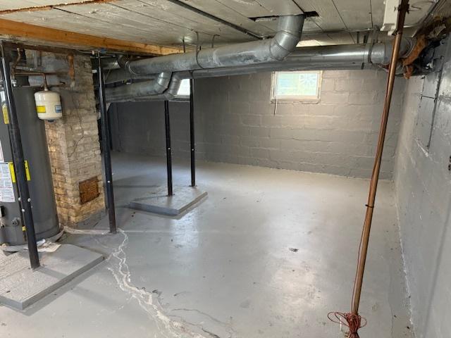 1023 N Elmwood Ave, Waukegan, IL 60085 - basement with water heater