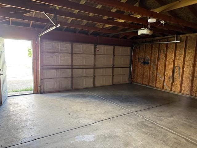 1023 N Elmwood Ave, Waukegan, IL 60085 - garage featuring a garage door opener