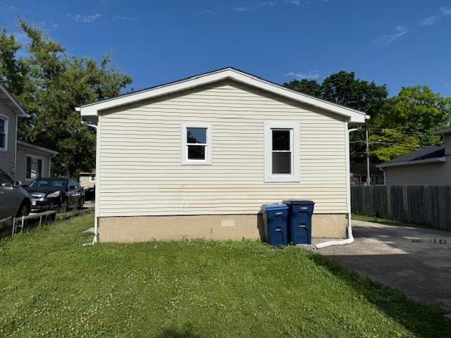 1023 N Elmwood Ave, Waukegan, IL 60085 - view of side of property with crawl space