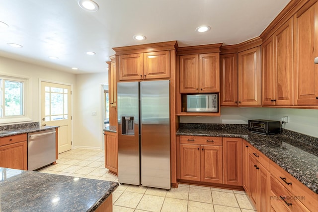 16 Yorkshire Dr, Lincolnshire, IL 60069 - kitchen with appliances with stainless steel finishes, brown cabinets, light tile patterned floors, and recessed lighting