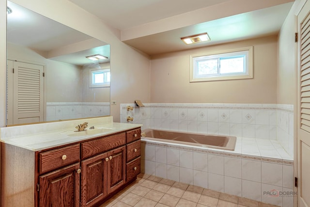 16 Yorkshire Dr, Lincolnshire, IL 60069 - bathroom featuring tile patterned floors, a bath, vanity, and a closet
