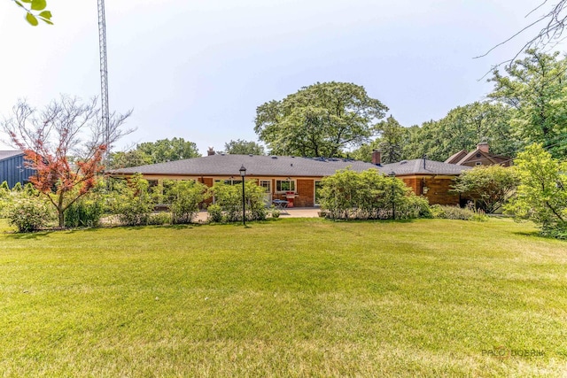 16 Yorkshire Dr, Lincolnshire, IL 60069 - view of green lawn with a patio area